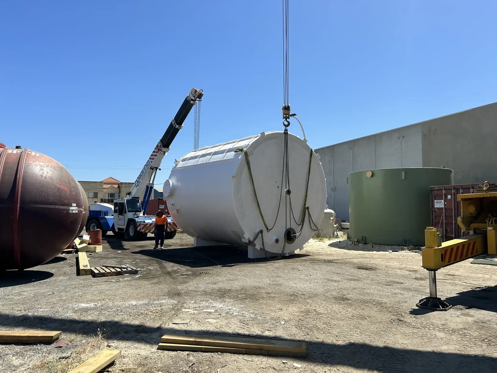 Vertical FRP chemical tank for Ixom set down in the yard